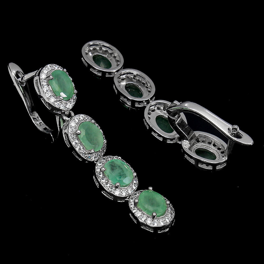 A pair of 925 silver drop earrings set with oval cut emeralds and white stones, L. 3.7cm. - Image 2 of 2