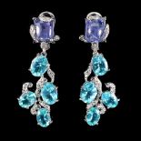 A pair of 925 silver drop earrings set with cabochon cut tanzanites and oval cut blue topaz, L. 4.