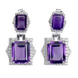 A pair of 925 silver drop earrings set with emerald cut amethysts and white stones, L. 2.4cm.