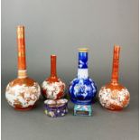 A group of three Japanese porcelain vases together with a further Oriental design vase and two