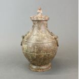 A Chinese Archaic form bronze jar and lid, H. 30cm.