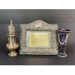 A hallmarked silver front photo frame with a hallmarked silver sugar shaker and silver and cobalt