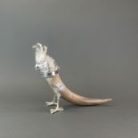 An impressive cattle horn and silver plated cockatoo inkwell, H. 29cm. L. 38cm.