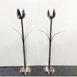 A pair of stylish Italian contemporary 'Mesa' chromium plated metal candlesticks, H. 60cm.