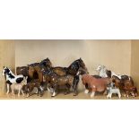 A group of Beswick and other horse figures.
