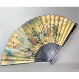 A large Chinese hand-painted lacquered bamboo fan, L. 80cm. together with a further hand-painted fan