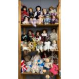 An extensive collection of porcelain and other dolls and toys.