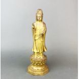 A Chinese gilt bronze figure of the goddess Guanyin, H. 28cm.