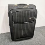 Antler mid size expandable striped suitcase, 63 x 43 x 28cm.