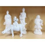 A group of Chinese blanc de Chine porcelain figures, tallest 27cm. Water buffalo repaired.