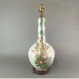 A 19th Century Japanese hand-painted and gilt porcelain vase mounted as a table lamp, H. 61cm.