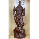 A large Chinese carved hardwood figure of lucky warrior emperor, H. 79cm.