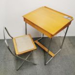 A vintage Tri-ang child's school desk with inkwell and matching chair, desk 66 x 53 x 43cm in