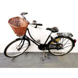 A vintage Pashley ladies Road bicycle with Sturmey-Archer gears and basket, bell and light,
