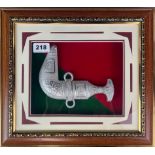 A framed Eastern replica dagger, frame size 36 x 31cm.