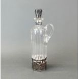 A Continental silver mounted cut glass decanter, H. 29cm.
