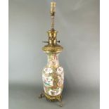 A 19th Century Canton enamelled porcelain vase mounted c. 1920 as a table lamp, H. 68cm. Porcelain