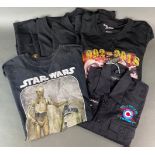 A group of promotional t-shirts.