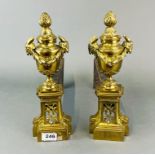 A pair of classical gilt brass andirones, H. 30cm.