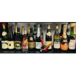 A collection of mixed wines and other alchohol.