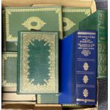 An extensive quantity of green leather bound novels of famous authors.