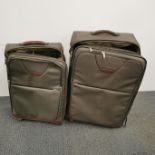 A Samsonite mid size suitcase and further matching case inside, 60 x 39 x 27cm.