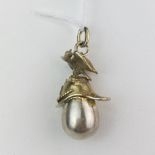 A Russian .84 silver gilt egg and helmet pendant, H. 4cm.