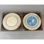 A pair of framed Chinese hand embroidered silk panels, frame size 32 x 32cm.