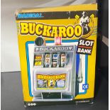 A boxed Buckaroo slot bank.