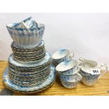 An extensive Edwardian bone china tea set, 9 cups and saucers, 12 side plates, 2 sandwich plates,