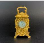 A small gilt metal carriage clock, H. 10cm.