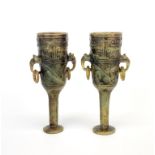An interesting pair of Chinese carved jade/hardstone wine cups with integral elephant head and