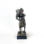 A bronze figure of an Arab water seller, H. 24cm.