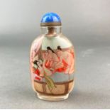 A Chinese erotic inside painted snuff bottle, H. 9.5cm.