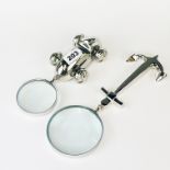 Two interesting metal handled magnifying glasses, longest 30cm.