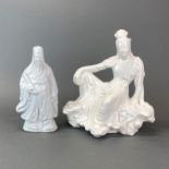 A Chinese blanc de Chine porcelain figure of the goddess Guanyin seated on a rock, H. 32cm. together
