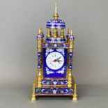 A Chinese cloisonne and champleve enamelled mantle clock, H. 33cm.