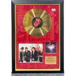 Rolling Stones and autograph interest: A framed gold disc of The Stones Bigger Bang signed by all