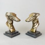 A pair of bronze Art Deco style grey hound busts on polished marble bases, H. 22cm.
