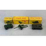 Three boxed Dinky Toys diecast model equipment: model no. 692, model no. 670, model no. 80C.