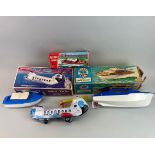 Three vintage boxed battery operated models consisting of Panam Sky Taxi by Haji, a Derwent Cabin