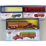 Three boxed (reproduction) Dinky Supertoys diecast vehicles: model no. 943, no. 934 and no. 36B.