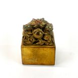 A Chinese gilt bronze Imperial style seal, 8 x 8 x 10cm.