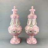 A pair of large continental pink and gilt porcelain jars and lids, H. 58 cm.