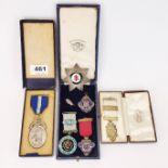 A group of mixed silver Masonic and other medals.