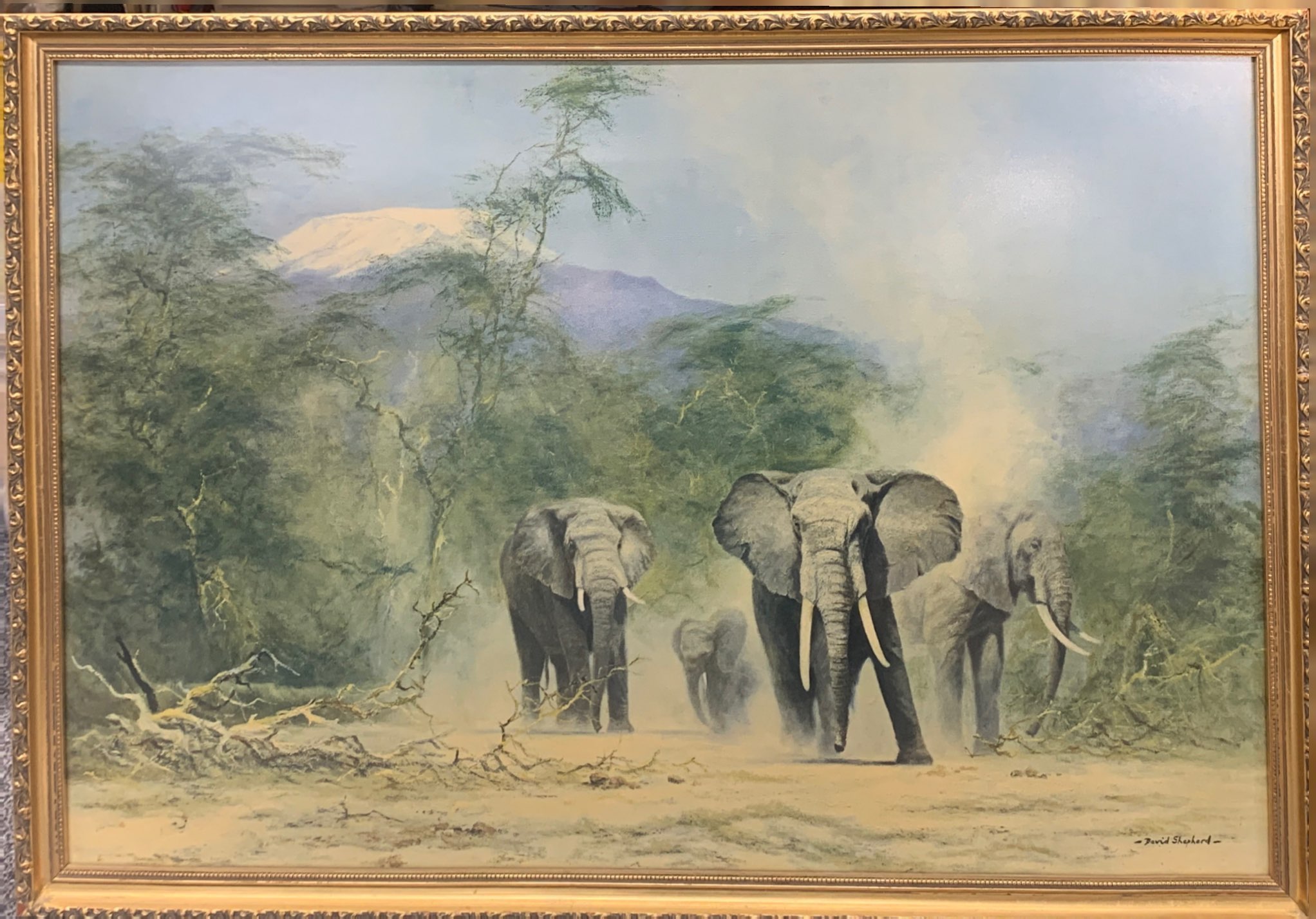 A gilt framed David Shepherd lithograph of elephants, frame size 55 x 81cm.