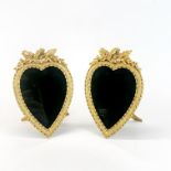 A pair of lovely heart-shaped gilt metal photo frames, H. 19cm.