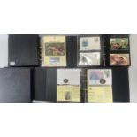 Seven albums of WWF first day cover stamps.