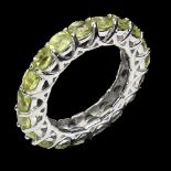 A 925 silver peridot set full eternity ring, (N).