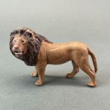 A Vienna style cold-painted bronze model of a lion, L. 10cm. H. 6.5cm.